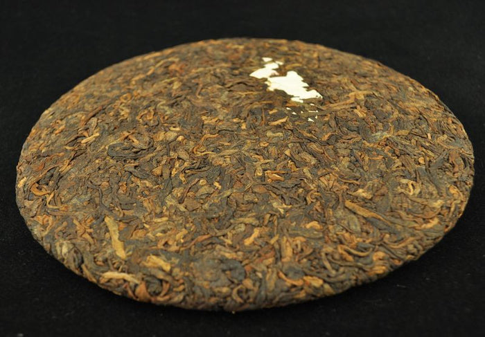 2012 Yong Pin Hao Menghai Qi Zi Bing 121 Ripe Pu-erh Tea Cake