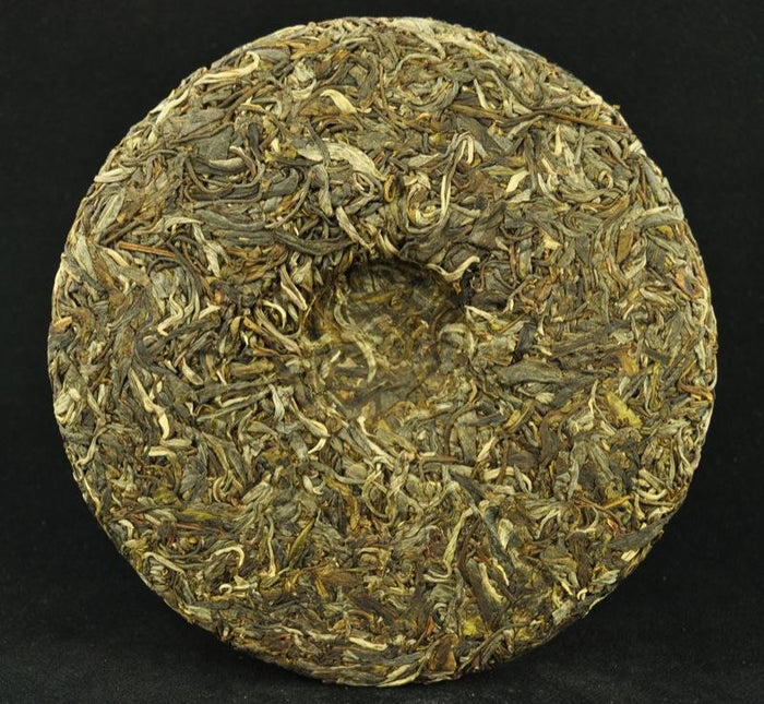 2013 Yunnan Sourcing "Autumn Qing Mei Shan" Old Arbor Pu-erh Tea Cake