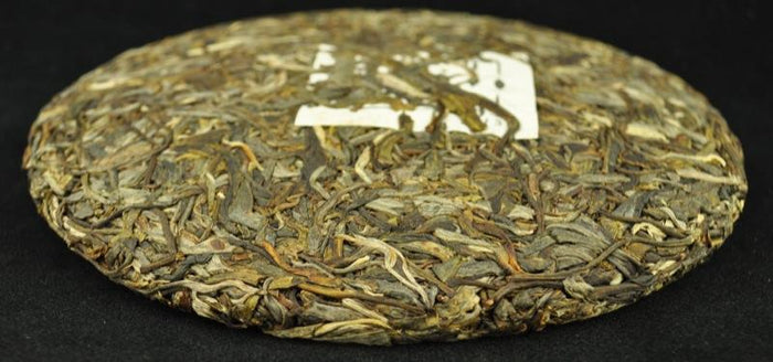 2013 Yunnan Sourcing "Autumn Qing Mei Shan" Old Arbor Pu-erh Tea Cake