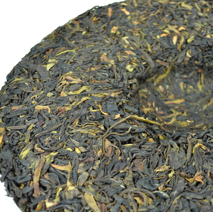 2016 Yunnan Sourcing "Dehong Ye Sheng Cha" Wild Tree Purple Tea Cake | Yunnan Sourcing Tea Shop
