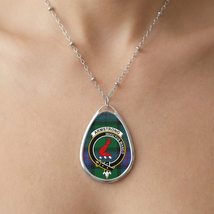 Close-up of Armstrong clan tartan pendant necklace with Invictus Maneo motto