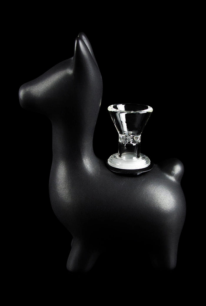 Three-quarter view of the matte black Art of Smoke Alpaca Bubbler shaped like a small standing alpaca with a clear glass bowl inset on its back