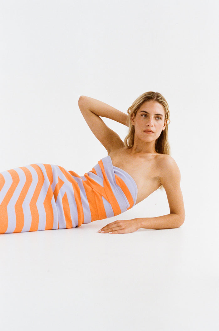 Women‚Äôs strapless Maxi Lilac Aude Dress with two-tone knit in Orange and Purple fitted silhouette gold back zip and flared hemline.