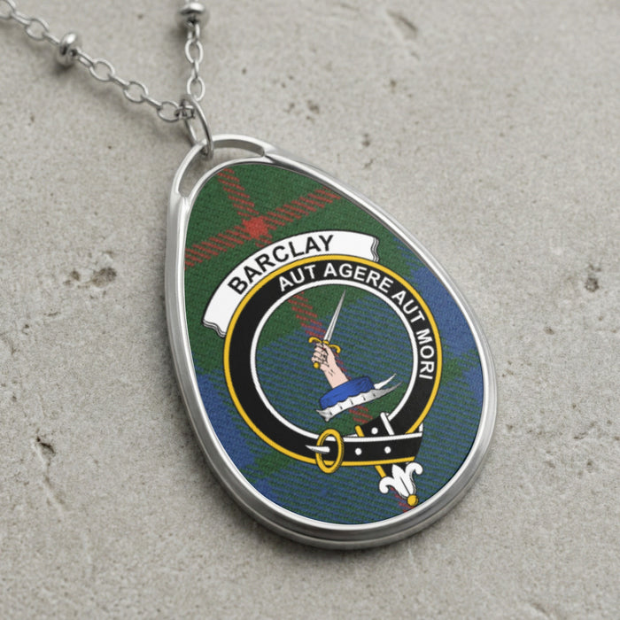 Barclay clan Scottish tartan necklace with clan crest and Aut Agere Aut Mori motto on tartan background