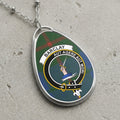 Barclay clan Scottish tartan necklace with clan crest and Aut Agere Aut Mori motto on tartan background