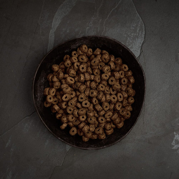 Close-up of the Canagan Light/Senior kibble, small round pieces in a pale golden brown