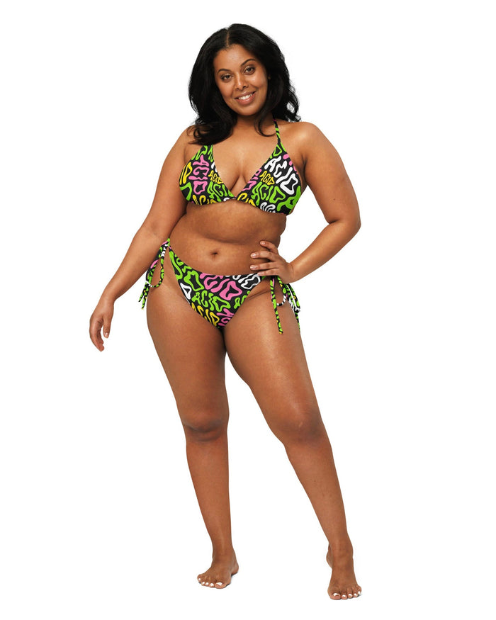 Model wearing the Candy Acid Triangle Top & Candy Acid String Bottoms by One Stop Rave