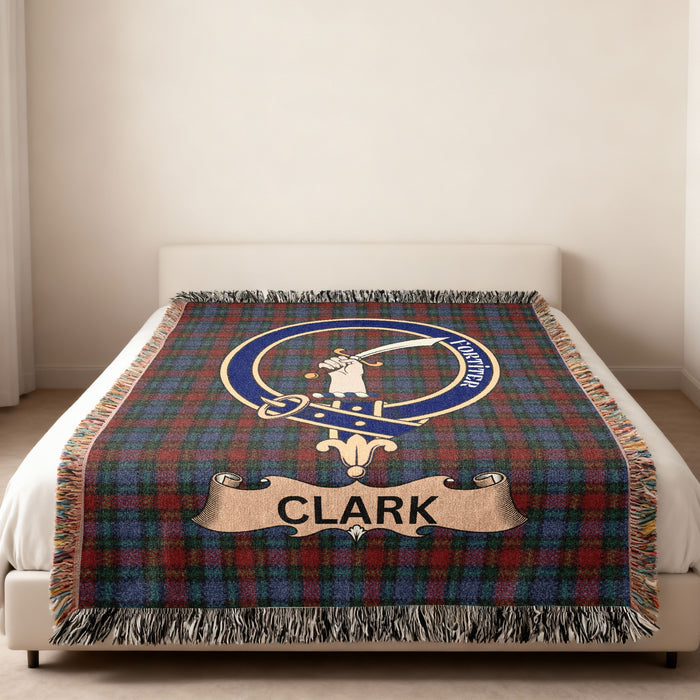 Clark family crest and name woven into tartan throw blanket