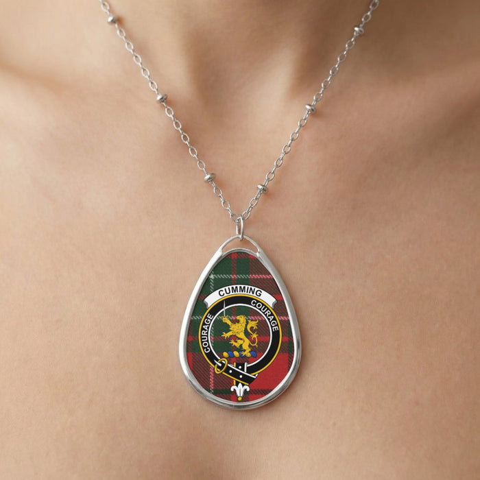 Close-up of Cumming clan tartan pendant necklace with crest design