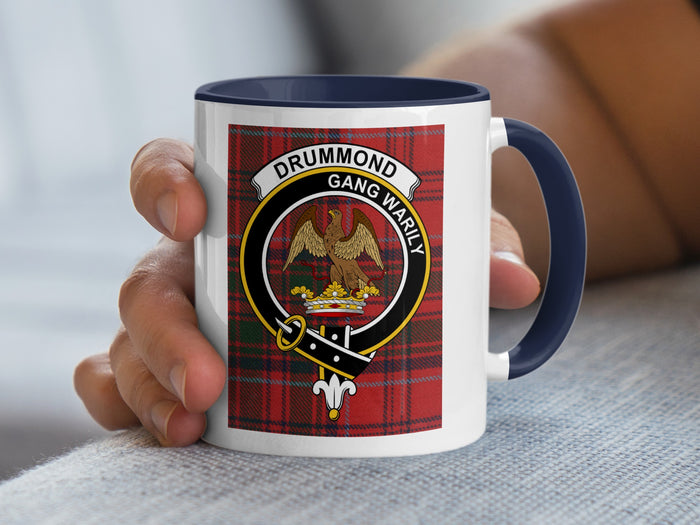 Drummond clan crest mug with Gang Warily motto — tartan background, held in hand