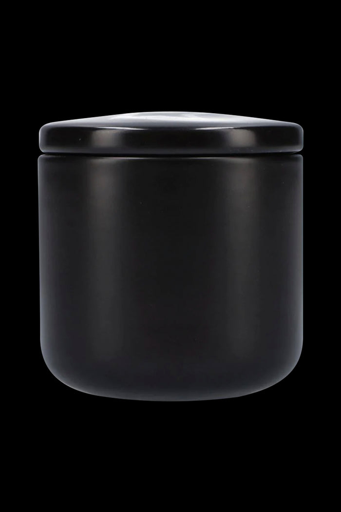 Black airtight cannabis storage jar.