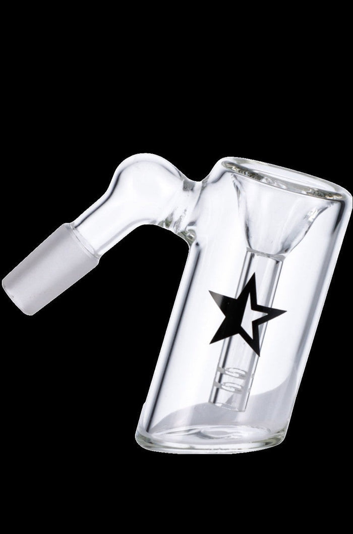 Angled close-up of the Famous X 45 Degree Glass Ash Catcher in clear glass with a black star logo against a solid black background