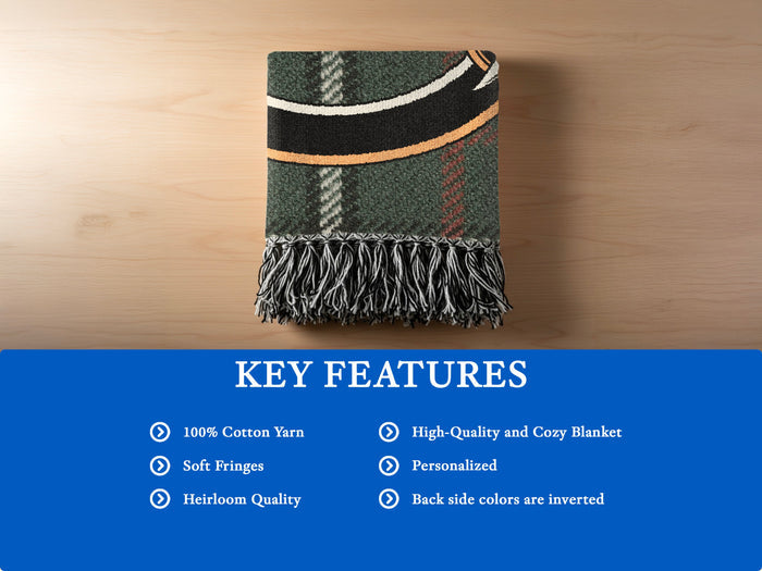 Ferguson woven blanket detail — green tartan with fringe edges