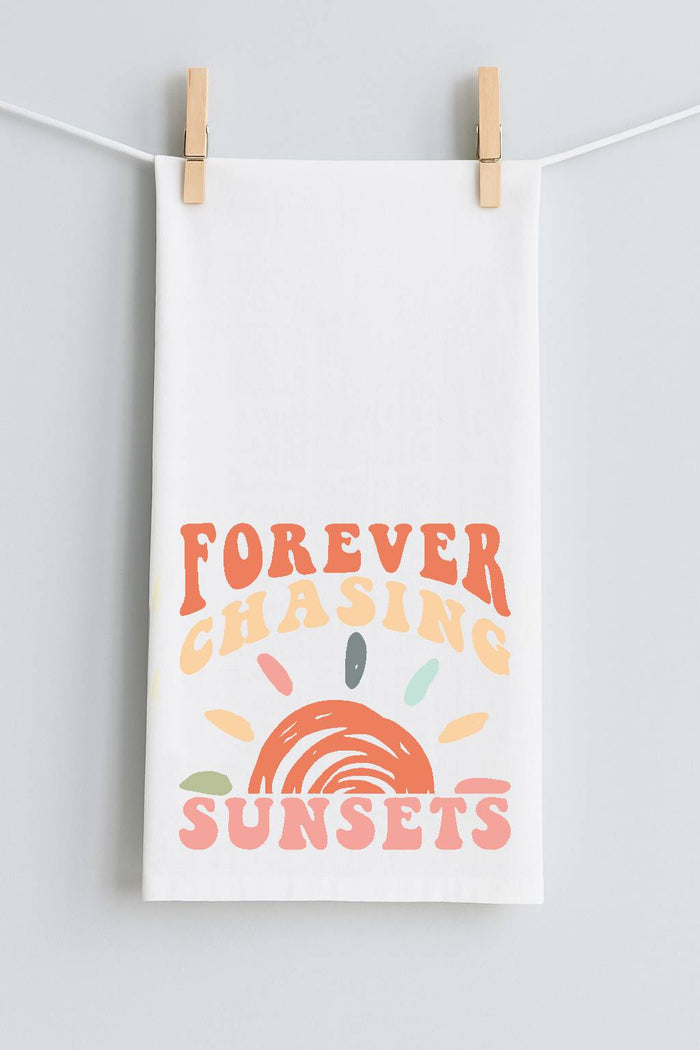 FOREVER CHASING SUNSETS TEA TOWEL