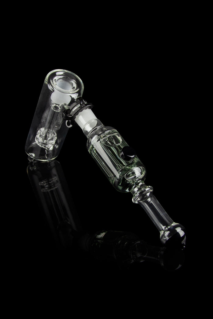 Clear glass oil rig with percolator, isolated on black.