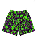 Shorts with green alien and marijuana leaf designs on a purple background