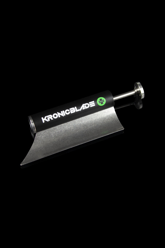 Silver cannabis grinder with “KronicBlade” logo against a black background.