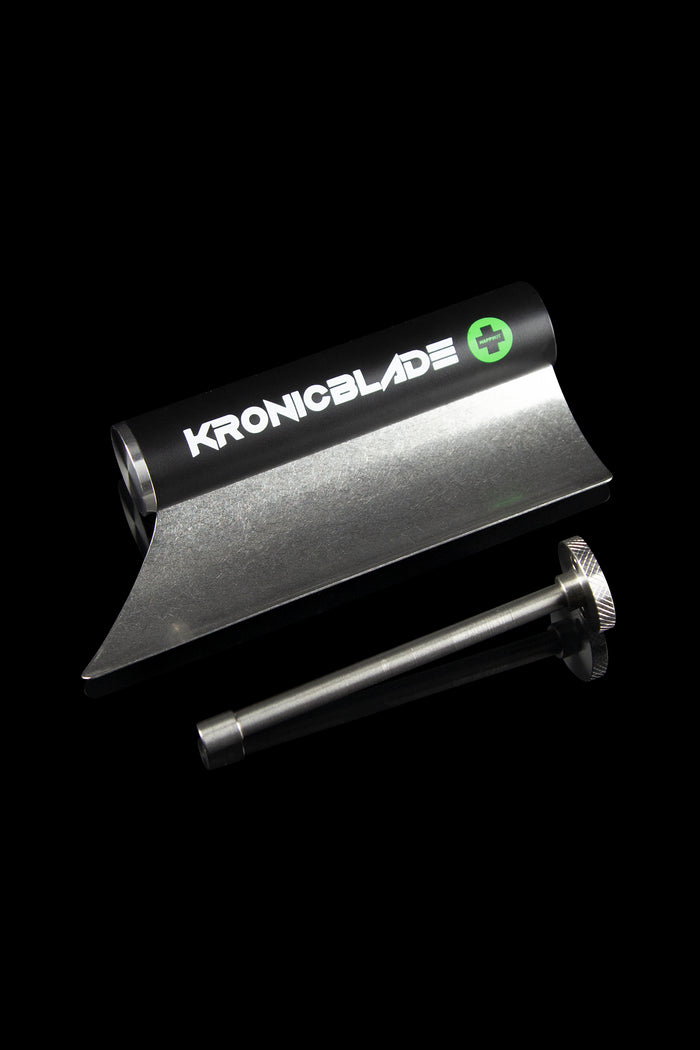 Metal grinder with “Kronicblade” logo against a black background.