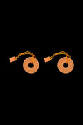 Two orange cannabis rosin press plates with looped yellow cords and orange end caps on a black background.