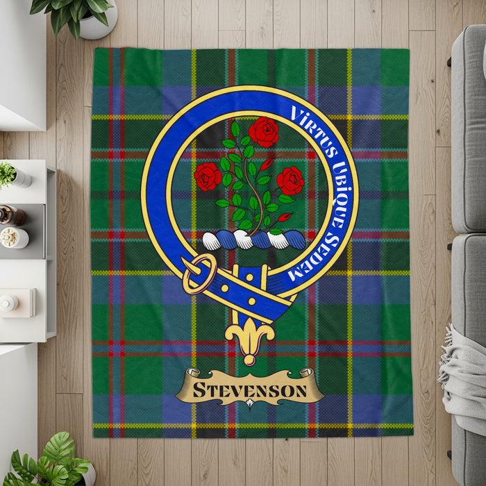 Stevenson crest and motto on tartan printed throw — detail view
