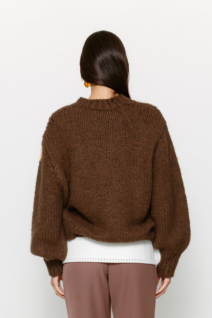 Relaxed fit women’s knit jumper in earthy brown with custom sun motif