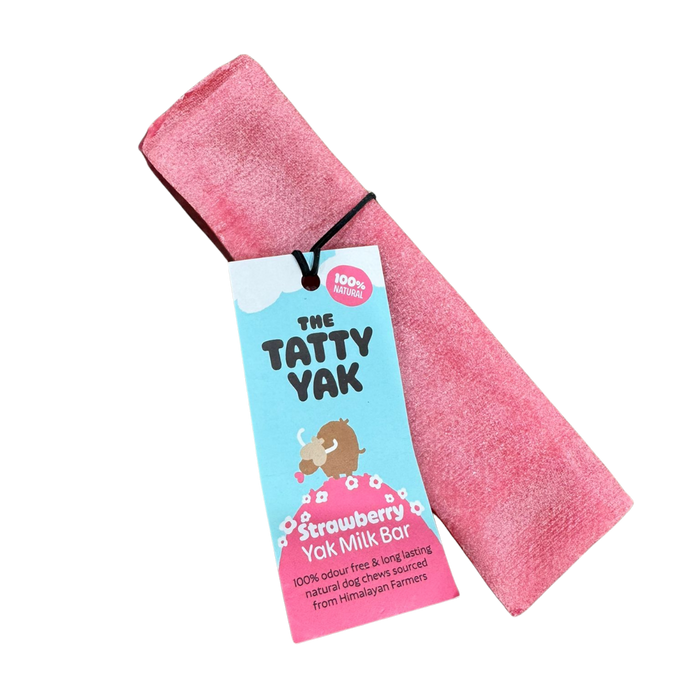 Tatty Yak strawberry flavoured yak milk chew for dogs, a hard pale pink-tinted bar