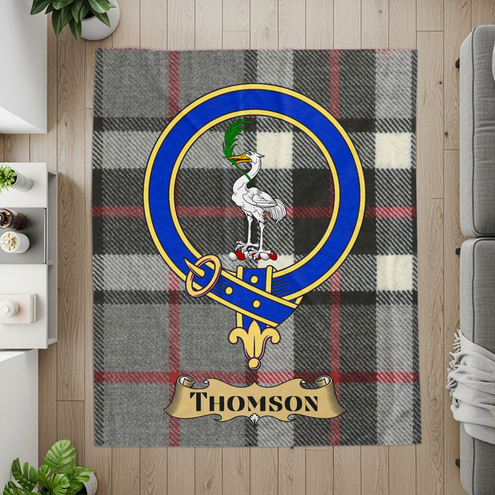 Thomson printed throw laid flat with name scroll and crest