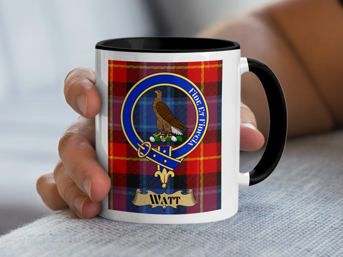 Watt clan crest coffee mug held in hand — tartan design detail