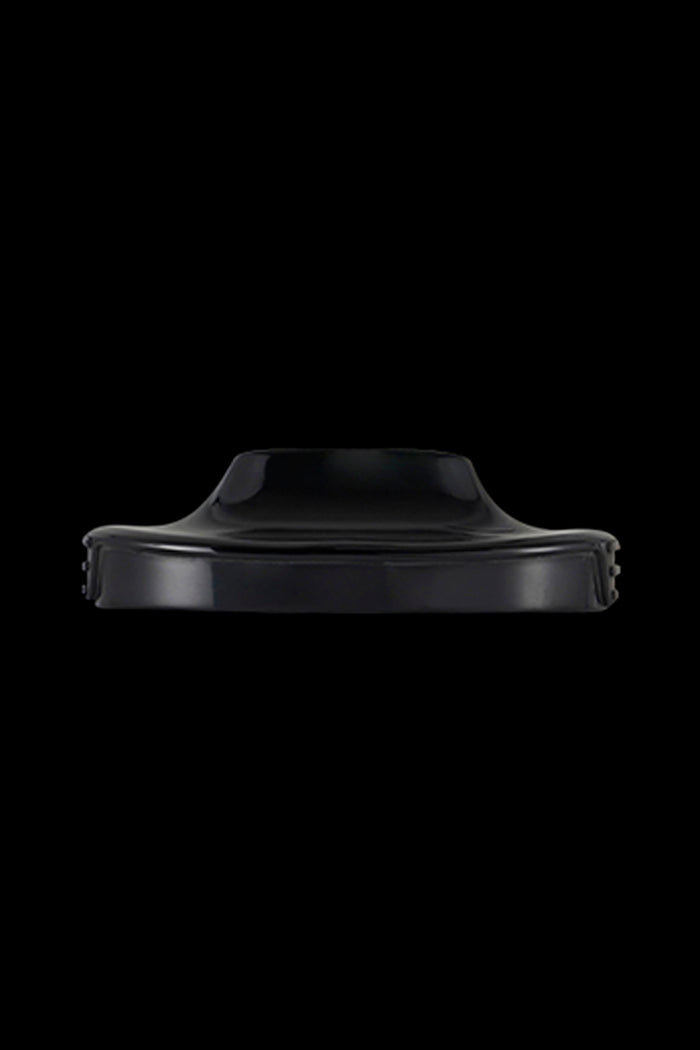 Black silicone cannabis concentrate container.