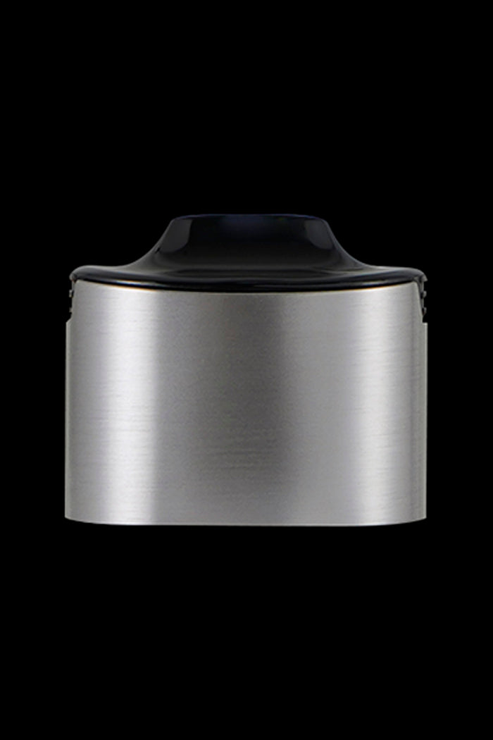 Silver cannabis oil concentrate container with black lid.